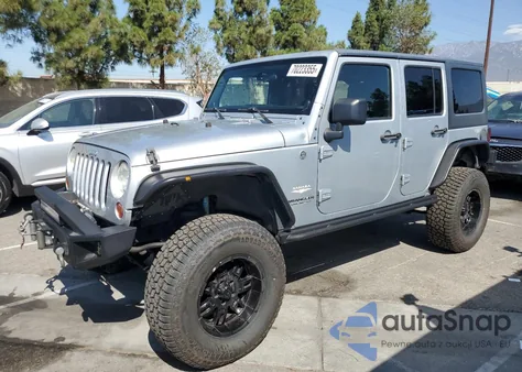 2011 Jeep Wrangler Unlimited Sahara из США, поврежденный, VIN 1J4BA5H16BL521963